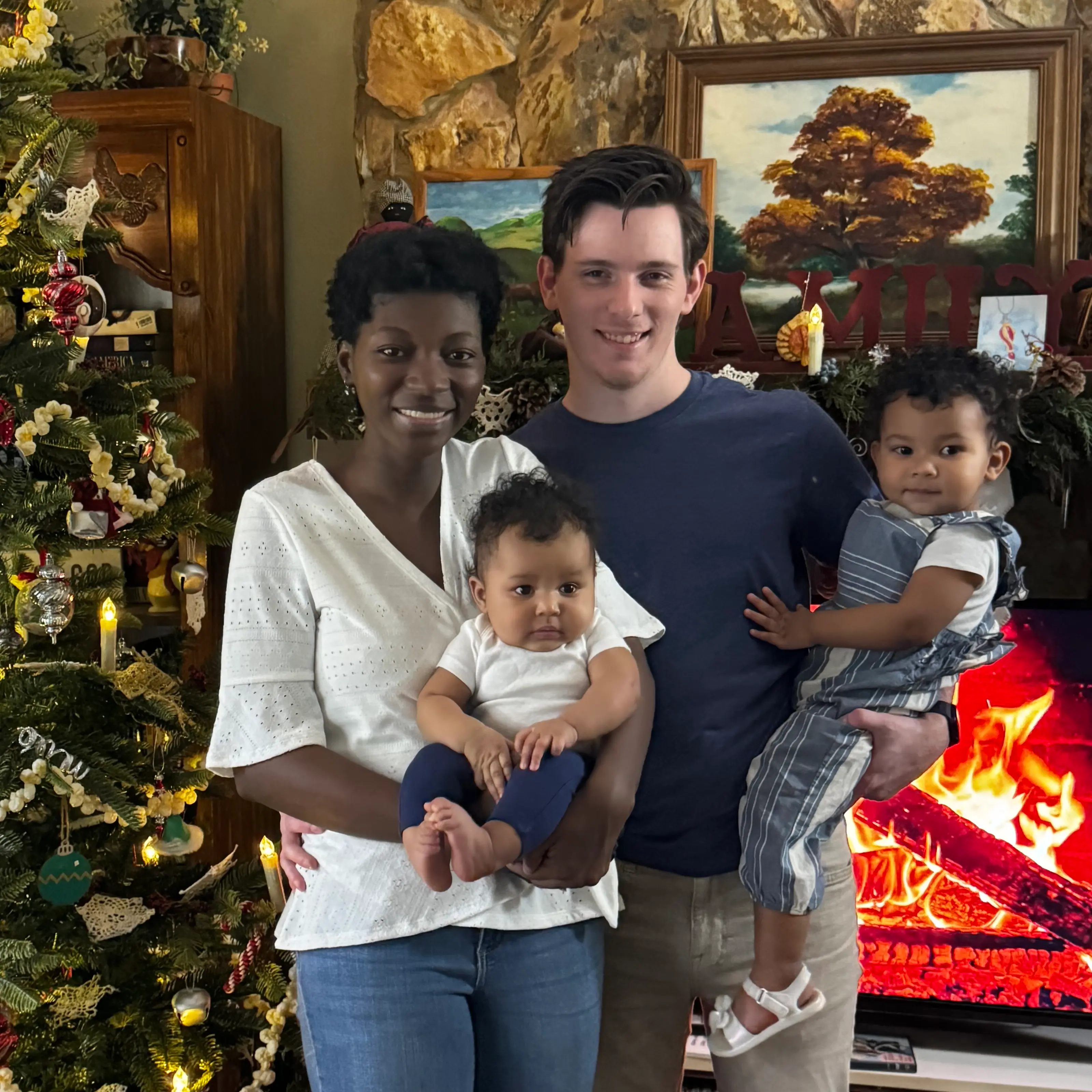 Braden holding his newborn daughter Sophia