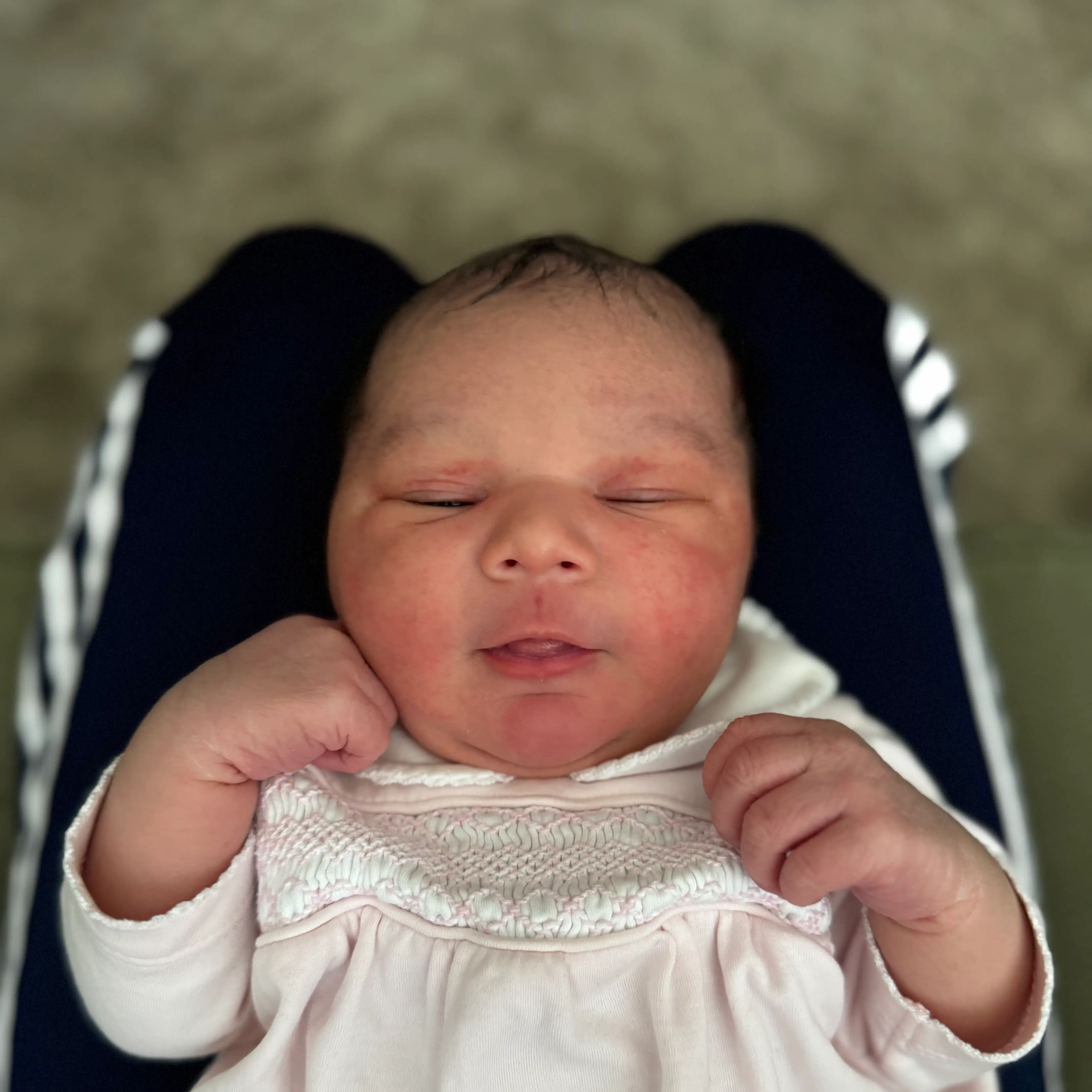 Braden holding his newborn daughter Sophia